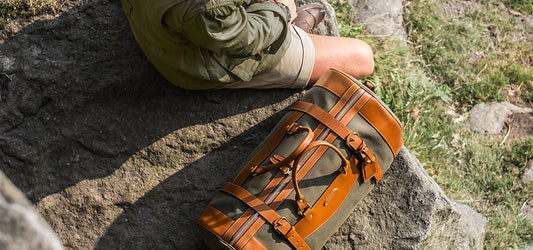 Man Sat with the Westley Richards Medium Sutherland Bag