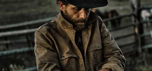 Man Wearing Filson Tin Cloth Olive Green Jacket & Tin Packer Hat