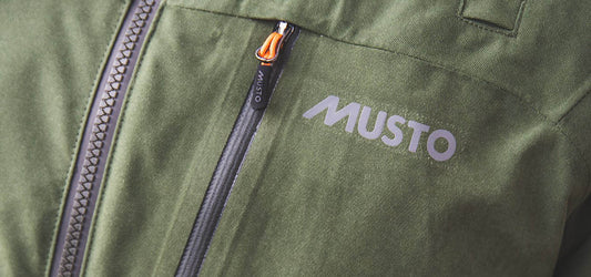 Logo on Musto HTX Keepers Jacket Colour Dark Moss