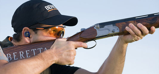 Competitor shooting Beretta Shotgun at Tokyo Olympic Event