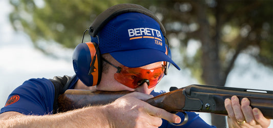 Clay Shooting with Beretta Shotgun Wearing Ear Protectors